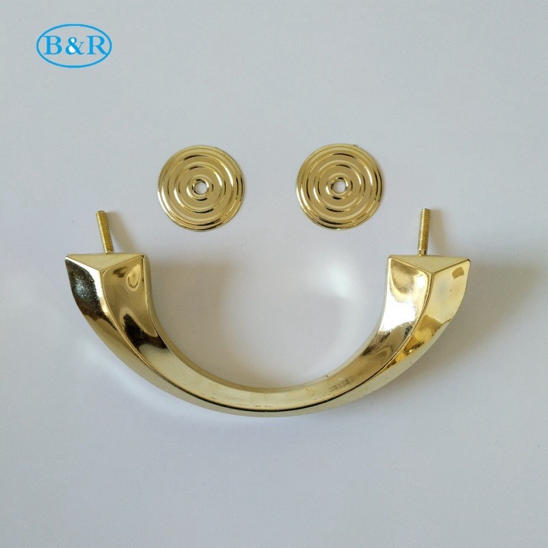 Moulded plastic coffin handle with metallised gold finish, 21.5 by 8.5 cm